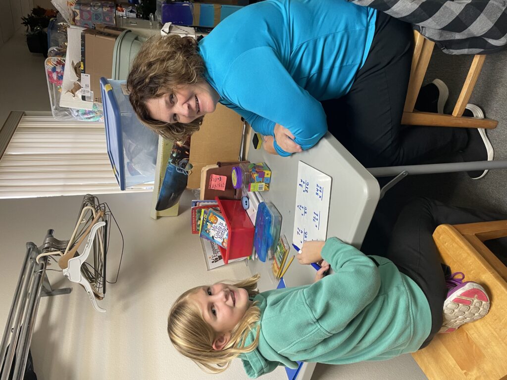 Lisa is the tutor for Empowered Tutoring (right) and Nora is the student (left)